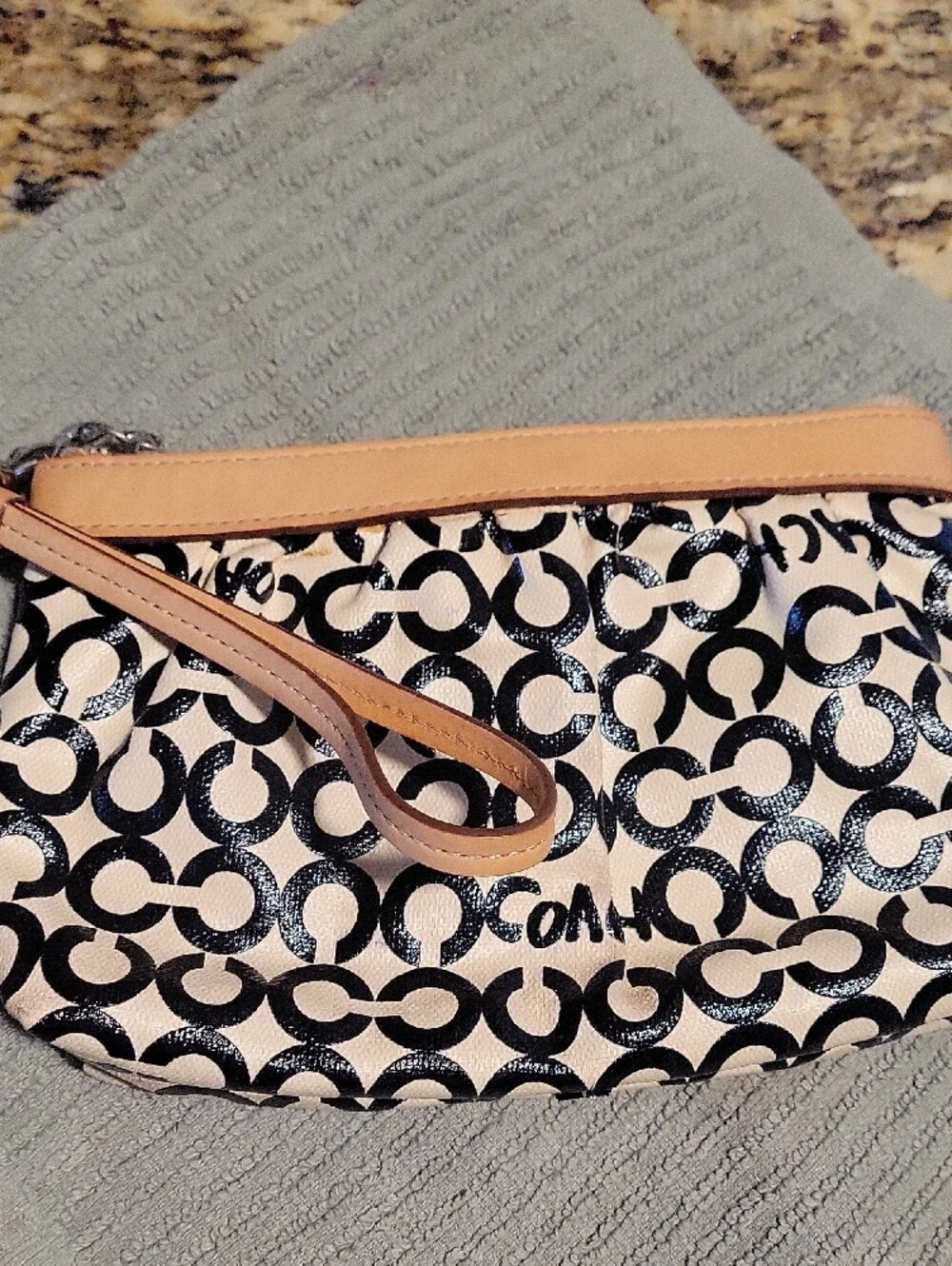 Coach Black and Cream Signature C Canvas Wristlet with Tan Leather Trim